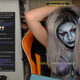 Streamer Djarii body-painting herself on Twitch.